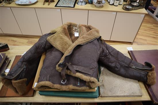 WWII RAF uniforms, flight jacket, goggles, formerly owned by Flight Lieutenant J F Hatton, together with shooting medals